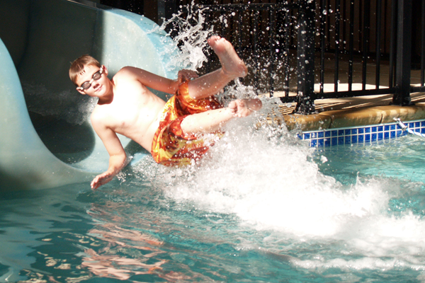 sliding down water slide