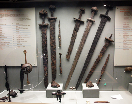 display of viking-era swords at the national history museum in dublin, ireland