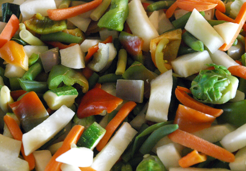 colorful garden vegetables chopped and ready for stir fry